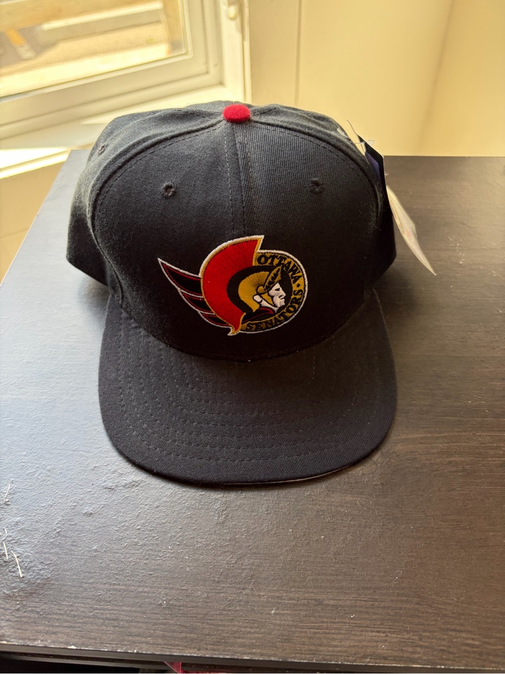 New Era Black and Gray Snapback Hat with Red Stitching